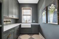 The modern laundry room truly offers an organizational retreat where efficiency and convenience combine in a harmonious blend of form and function, transforming mundane tasks into moments of exquisiteness and efficiency.