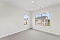 Secondary bedroom *photo is a different homesite with a similar floor plan and elevation*