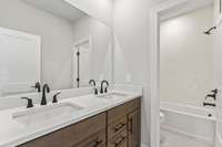 Secondary bath *photo is a different homesite with a similar floor plan and elevation*
