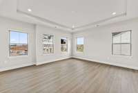 Primary bedroom *photo is a different homesite with a similar floor plan and elevation*