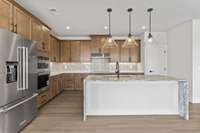 Kitchen *photo is a different homesite with a similar floor plan and elevation*