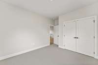 Secondary bedroom *photo is a different homesite with a similar floor plan and elevation*