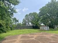 Spacious backyard with 2-car, rear entry garage