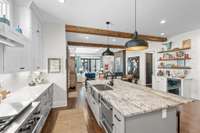 View of kitchen showing  bar with wine fridge