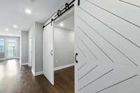 Modern sliding barn doors entering the Flex Room - a great space for an office or a guest bed!