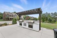 Community pool area with outdoor grills!