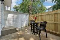 Updated fence with patio storage