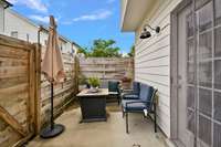 Back patio is private and the perfect spot for relaxing after a long day or starting your day with a cup of coffee.