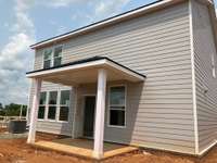Rear Covered patio that is going to be included on this incredible home