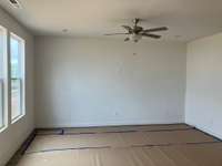 Great Room with ceiling fan and tons of natural lighting