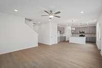Check out the spacious Great Room that will come included with LVP flooring.  Colors and selections may vary
