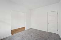 First floor office with closet that has an option of doors.