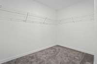 Large Owners suite walk in closet