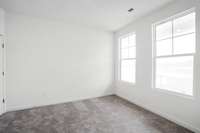 First floor office with closet that has an option of doors.
