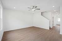 Check out the spacious Great Room that will come included with LVP flooring.  Colors and selections may vary