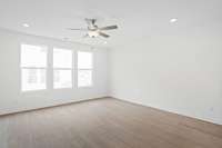Check out the spacious Great Room that will come included with LVP flooring.  Colors and selections may vary