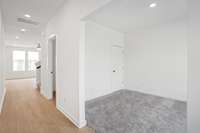 First floor office with closet that has doors that will be on this home