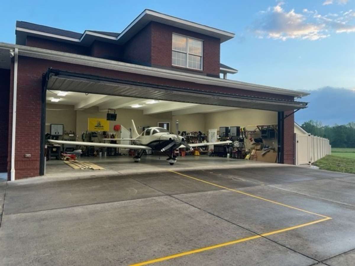 Welcome to beautiful 109 Chandelle with attached Hangar, a 40' door, 10' clearance.