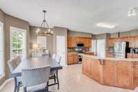 Make meal time easy with this eat-in kitchen and pantry.