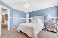 The door beside the bed leads to a thoughtfully finished additional "nook" space.