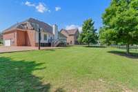 View looking towards the back of the home. The in-ground basketball goal stays with the home.