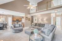 Easily move between the kitchen and living room in this open floor plan.