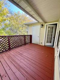 Private Balcony over looks natural area and has Storage Closet.