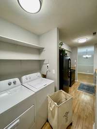Pantry and Washer/Dryer area tucked at back of Kitchen. Note: Washer/Dryer negotiable.