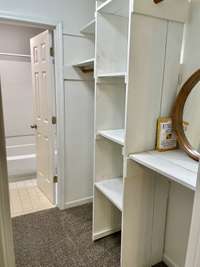 2nd Bedroom has Walk-In Walk-Through Closet with lots of storage, shelves and multi-level hanger options.