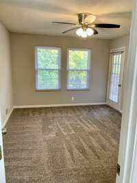 2nd Bedroom also overlooks natural area and 15-lite door leads to the private Balcony.