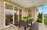 ***Picture Taken From Valleybrook Model Home In Millstone. Upgraded options in home***  The covered back patio measures 15' x 10' and is perfect for those looking to enjoy relaxing time outdoors or having family dinner outside.