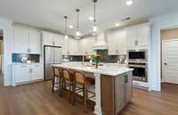 ***Picture Taken From Valleybrook Model Home In Millstone. Upgraded options in home***  This stunning gourmet Kitchen is designed with entertaining in mind!