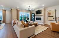 ***Picture Taken From Valleybrook Model Home In Millstone. Upgraded options in home***  The living space flows seamlessly to your covered rear patio with our high-end sliding glass doors. The doors allow for plenty of natural sunlight to enter.