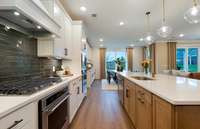 ***Picture Taken From Valleybrook Model Home In Millstone. Upgraded options in home***  The large island provides additional seating and storage,