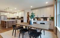 ***Picture Taken From Valleybrook Model Home In Millstone. Upgraded options in home***  The Breakfast Nook is located right off of the Kitchen and allows buyers to add the additional cabinetry shown as well.