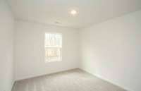 Bedroom #2 is located on the 2nd floor and measures 11' x 10' while also offering amazing views of the dedicated greenway.