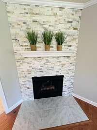 New tile/stone work on fireplace
