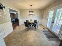 Dining area of kitchen.  Doors on right leads to the back covered deck
