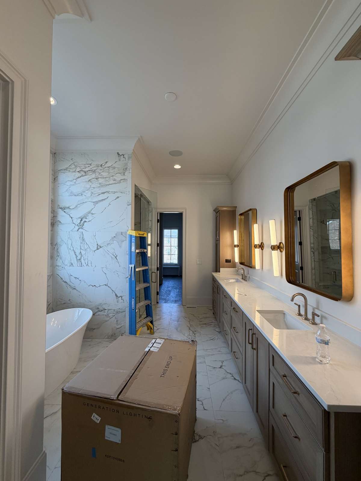 Primary bath with luxurious tile, spa-like shower, and an oversized closet.

*This home is under construction. Photo updated 3/20/26