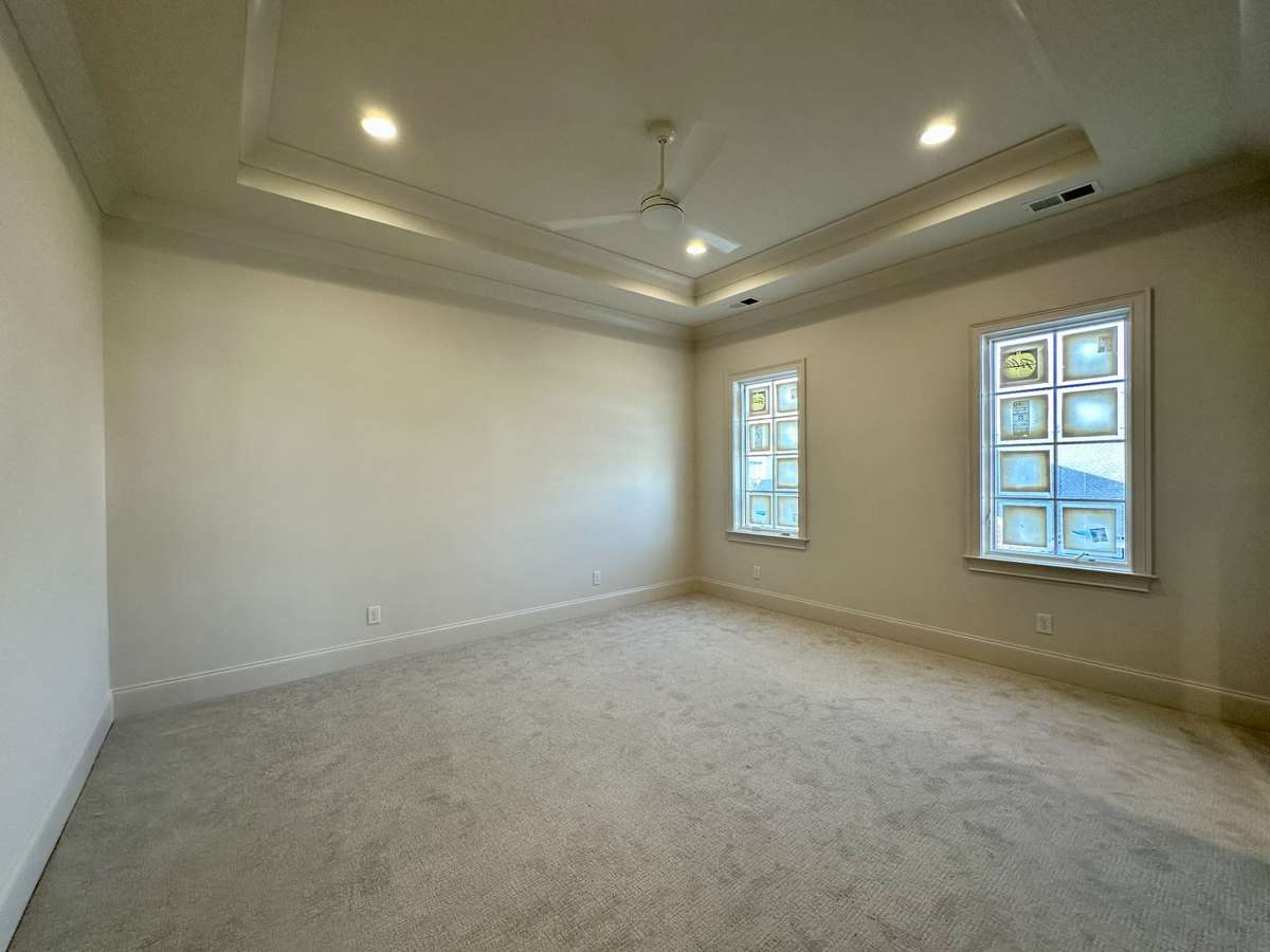 One of three ensuite bedrooms on the upper level.

*This home is under construction. Photo updated 2/20/26.