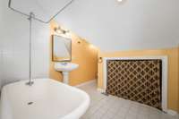 Upstairs bathroom with clawfoot tub