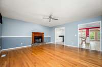 Another view of living room with gas fireplace