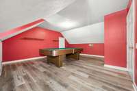 Second floor bedroom (pool table does not convey)