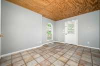 Flex room on main floor with walk-out door - office, workout room, whatever you like!