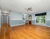Entry foyer/formal living room with gas fireplace