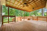 Did someone say backyard bar-b-que?  Three-tiered, covered deck - already set up for hot tub
