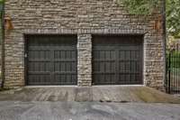 2 car garage off the kitchen. Entry to garage is on (side street) East Brookfield not Belle Meade Blvd