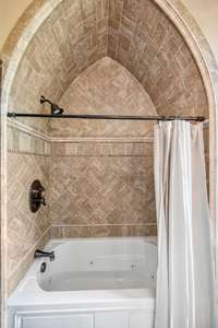arched shower/ bath combo