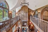 View of the fireplace in the library from the second floor