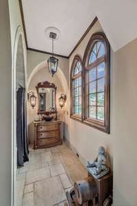 arched shower/ bath and windows  Gorgeous tilework